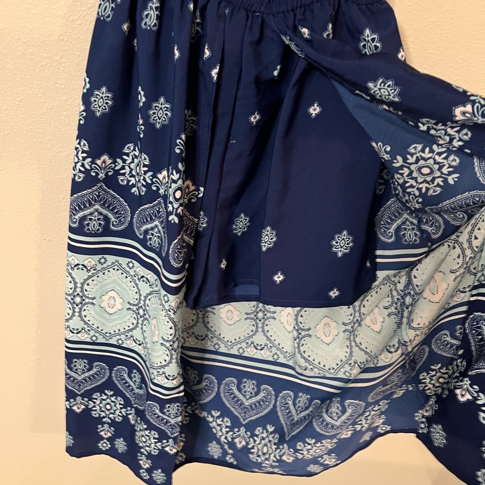 Navy one piece with shorts and wrap around